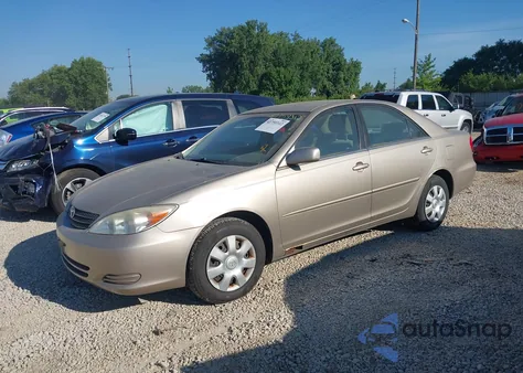 2003 Toyota Camry Le z USA, uszkodzony, nr VIN JTDBE32K130239667